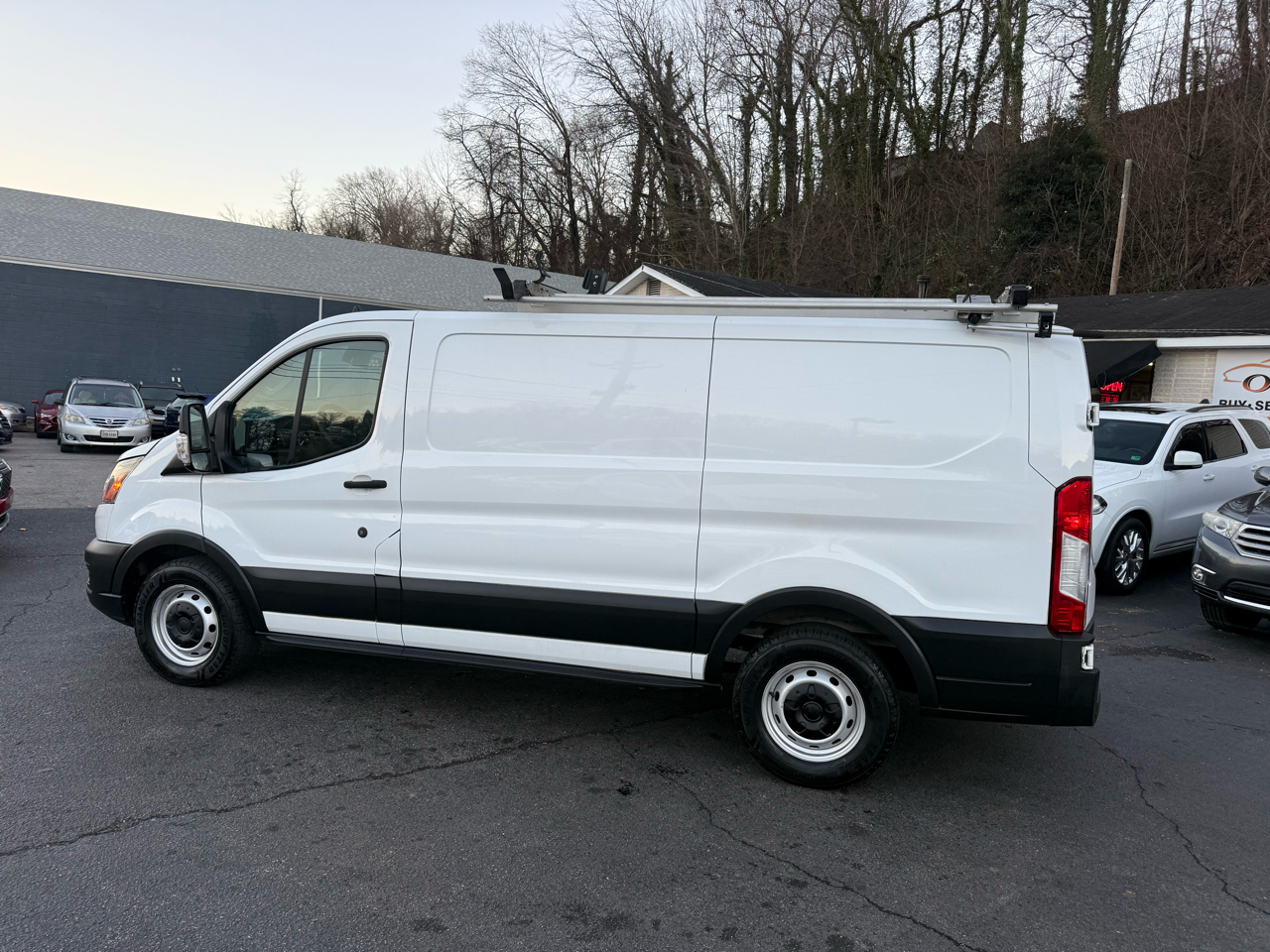 Ford Transit Cargo Van T-150 130" Low Rf 8670 GVWR RWD 2021