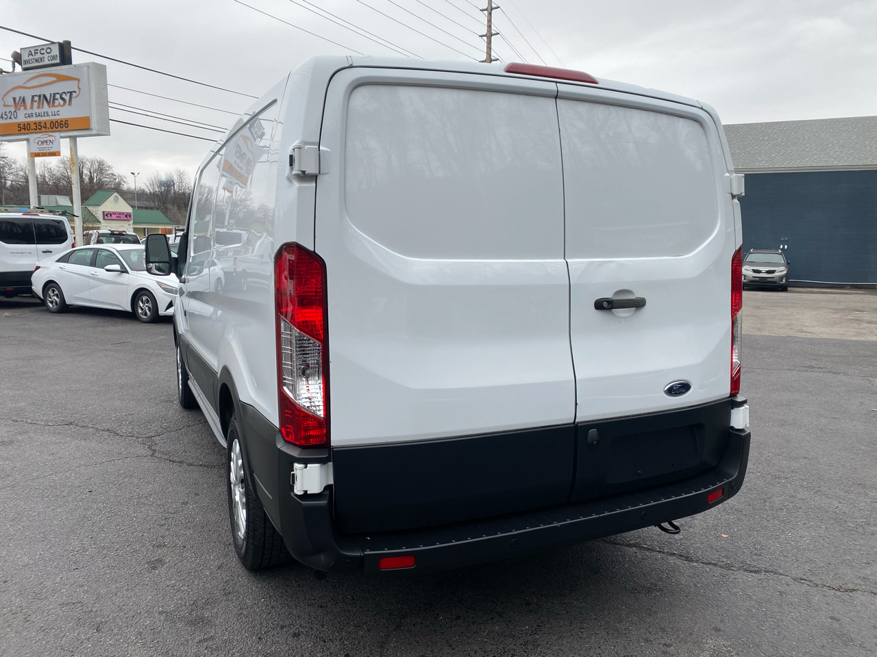 Ford Transit Cargo Van T-150 130" Low Rf 8670 GVWR RWD 2021