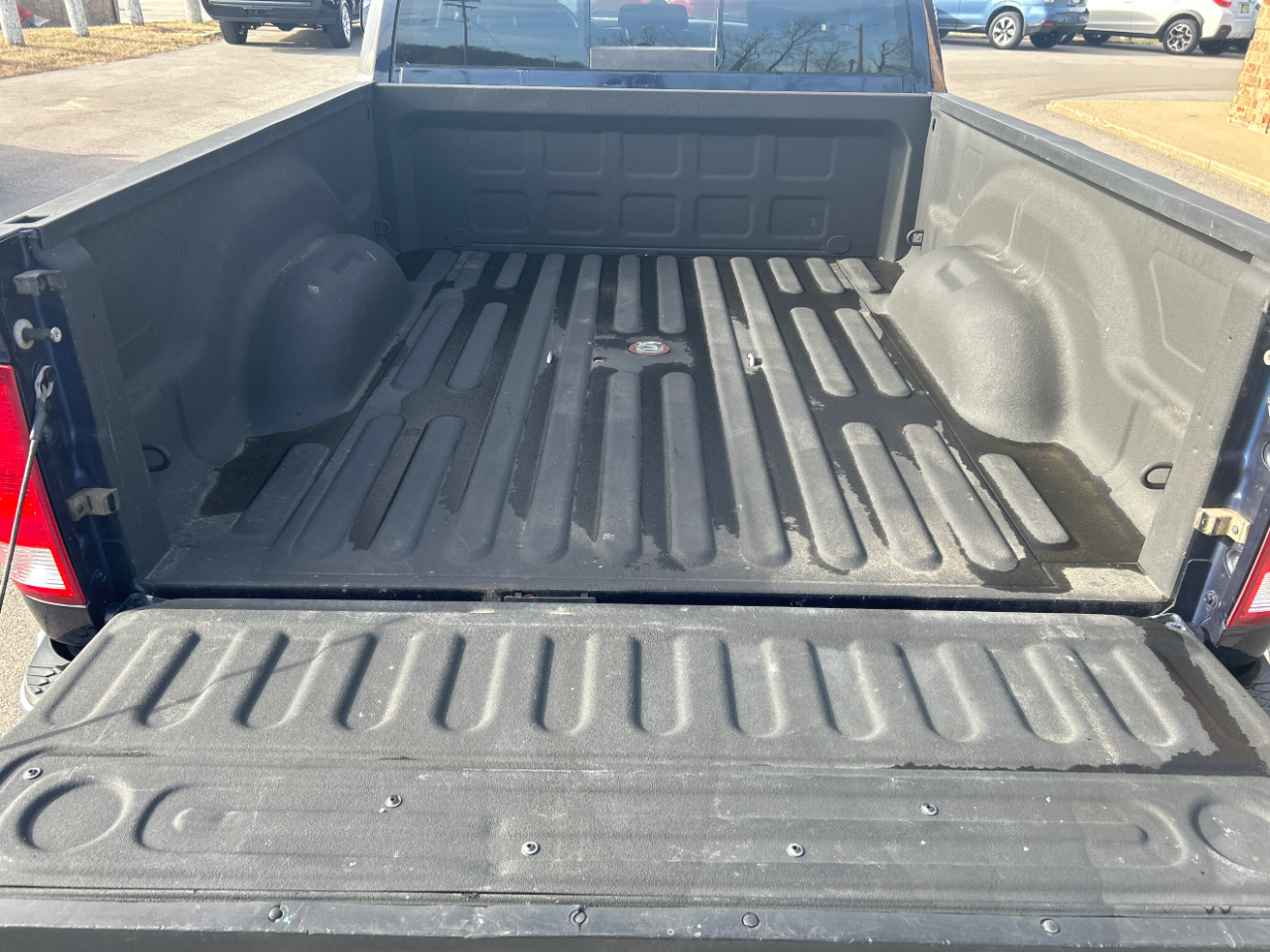 RAM 1500 4WD Quad Cab 140.5" Big Horn 2016