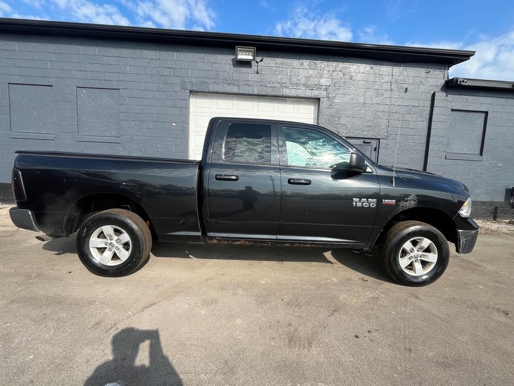 RAM 1500 4WD Quad Cab 140.5" SLT 2016