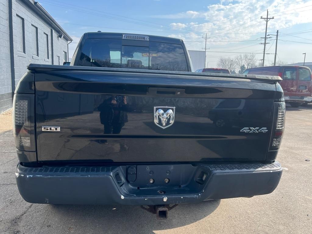 RAM 1500 4WD Quad Cab 140.5" SLT 2016