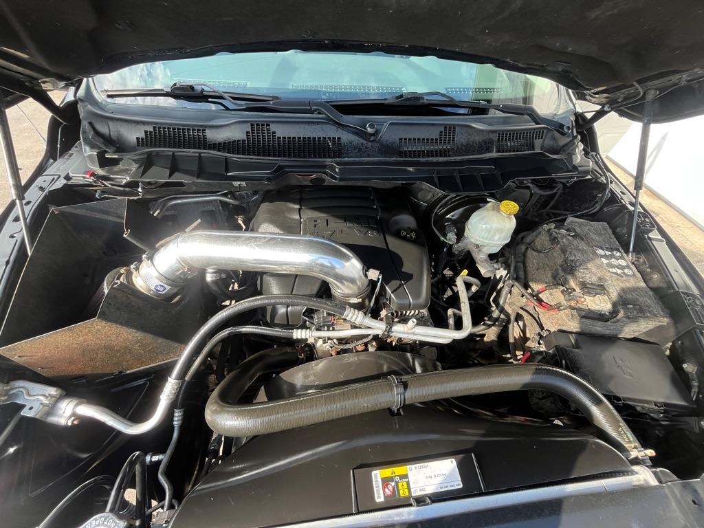 RAM 1500 4WD Quad Cab 140.5" SLT 2016