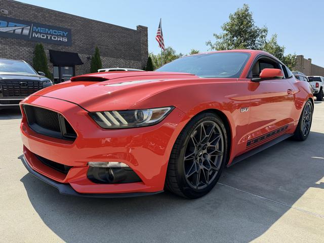 Orange 2015 Ford Mustang Coupe Rear-Wheel Drive Manual