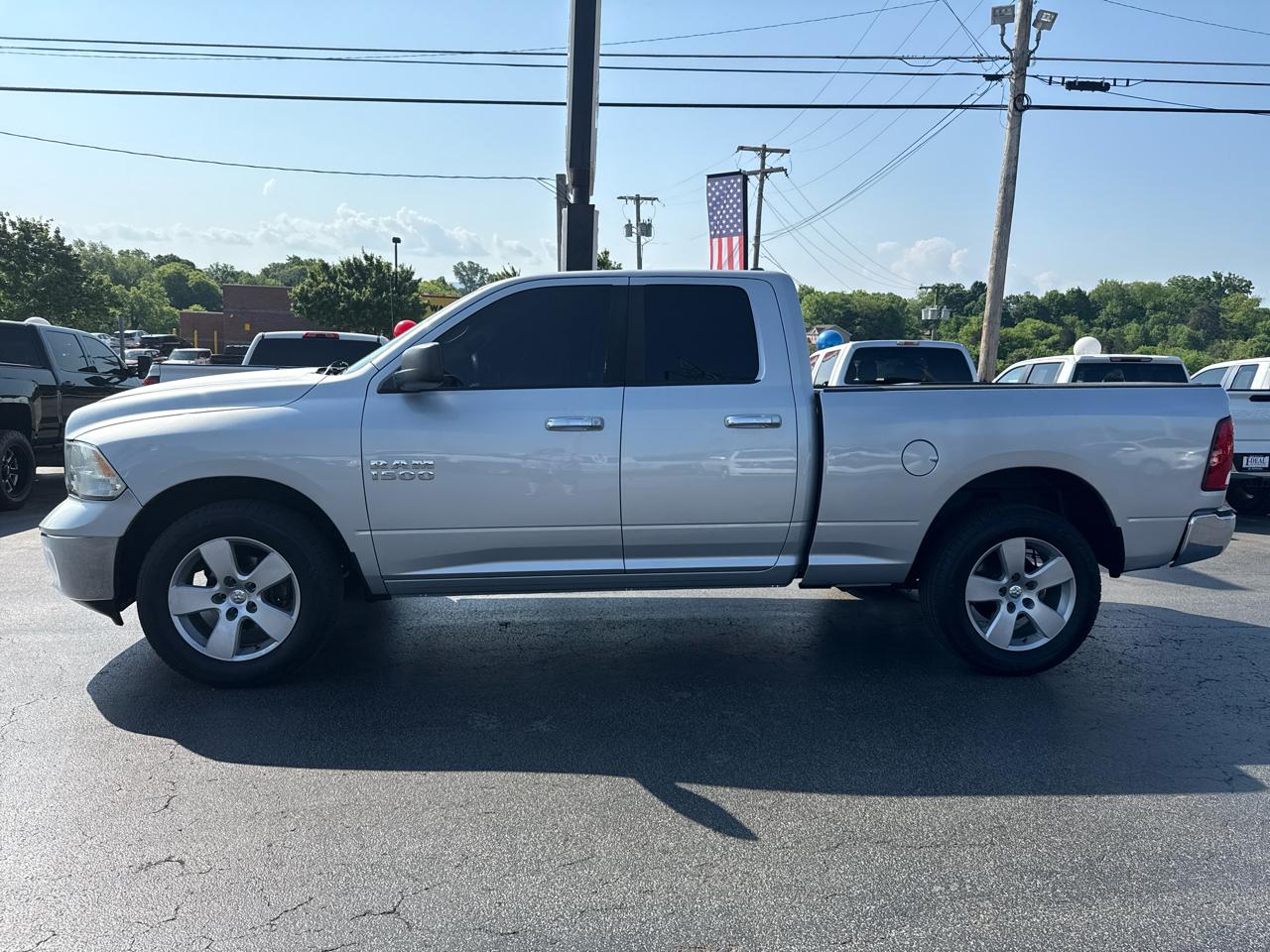 RAM 1500 4WD Quad Cab 140.5" SLT 2015