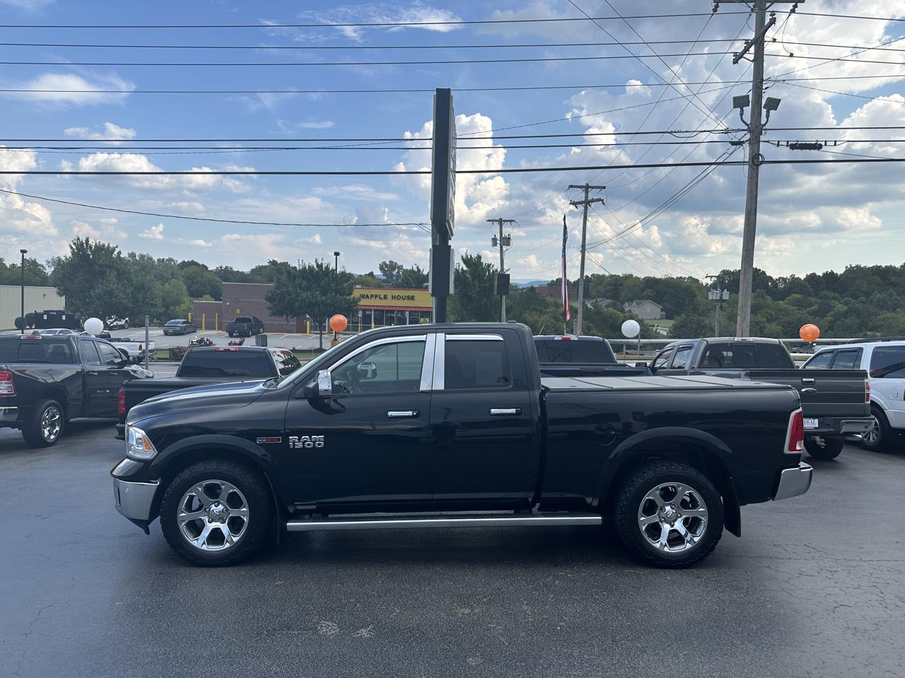RAM 1500 4WD Quad Cab 140.5" Laramie 2014