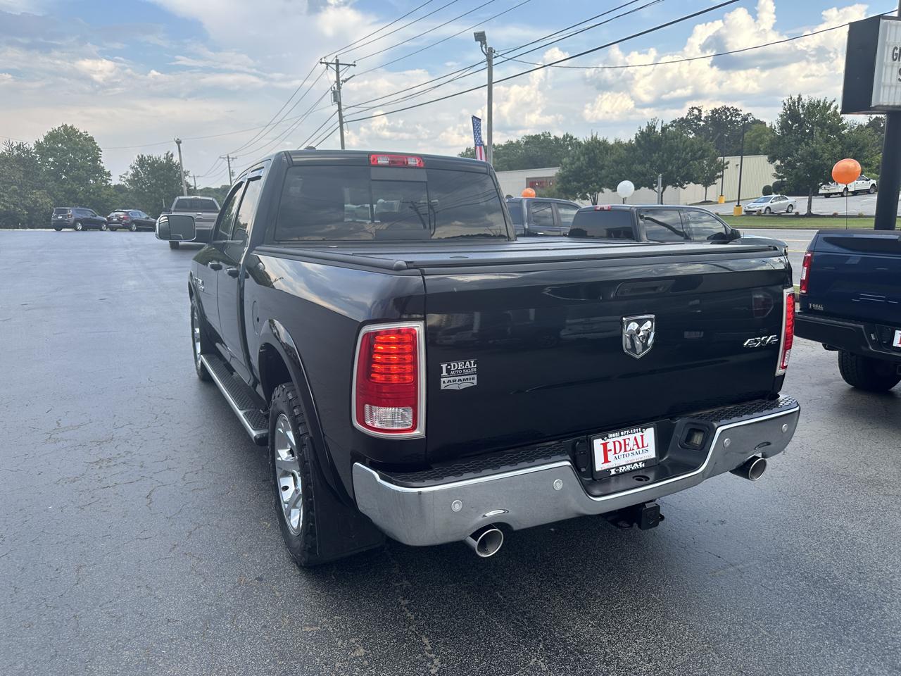 RAM 1500 4WD Quad Cab 140.5" Laramie 2014
