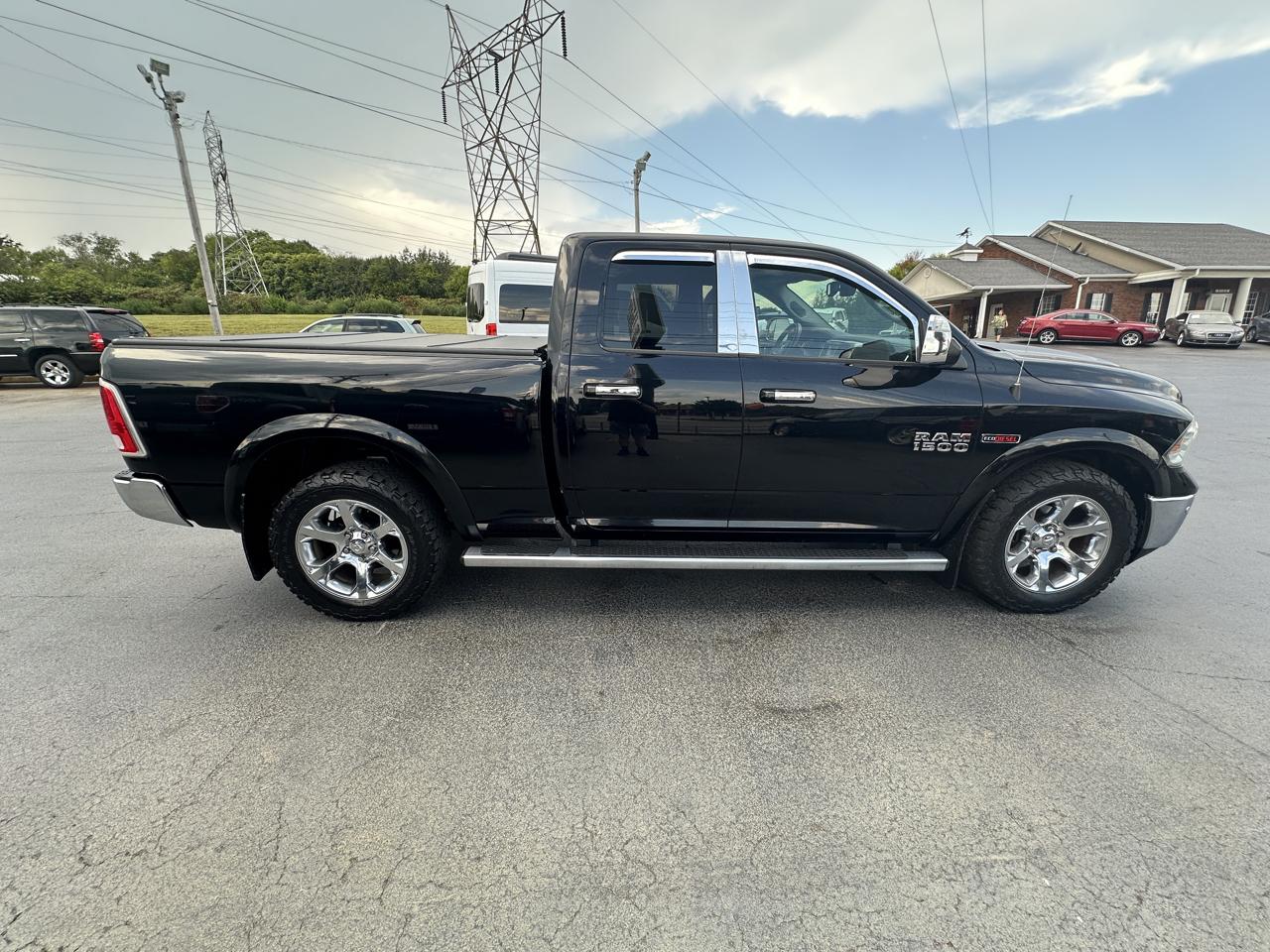 RAM 1500 4WD Quad Cab 140.5" Laramie 2014