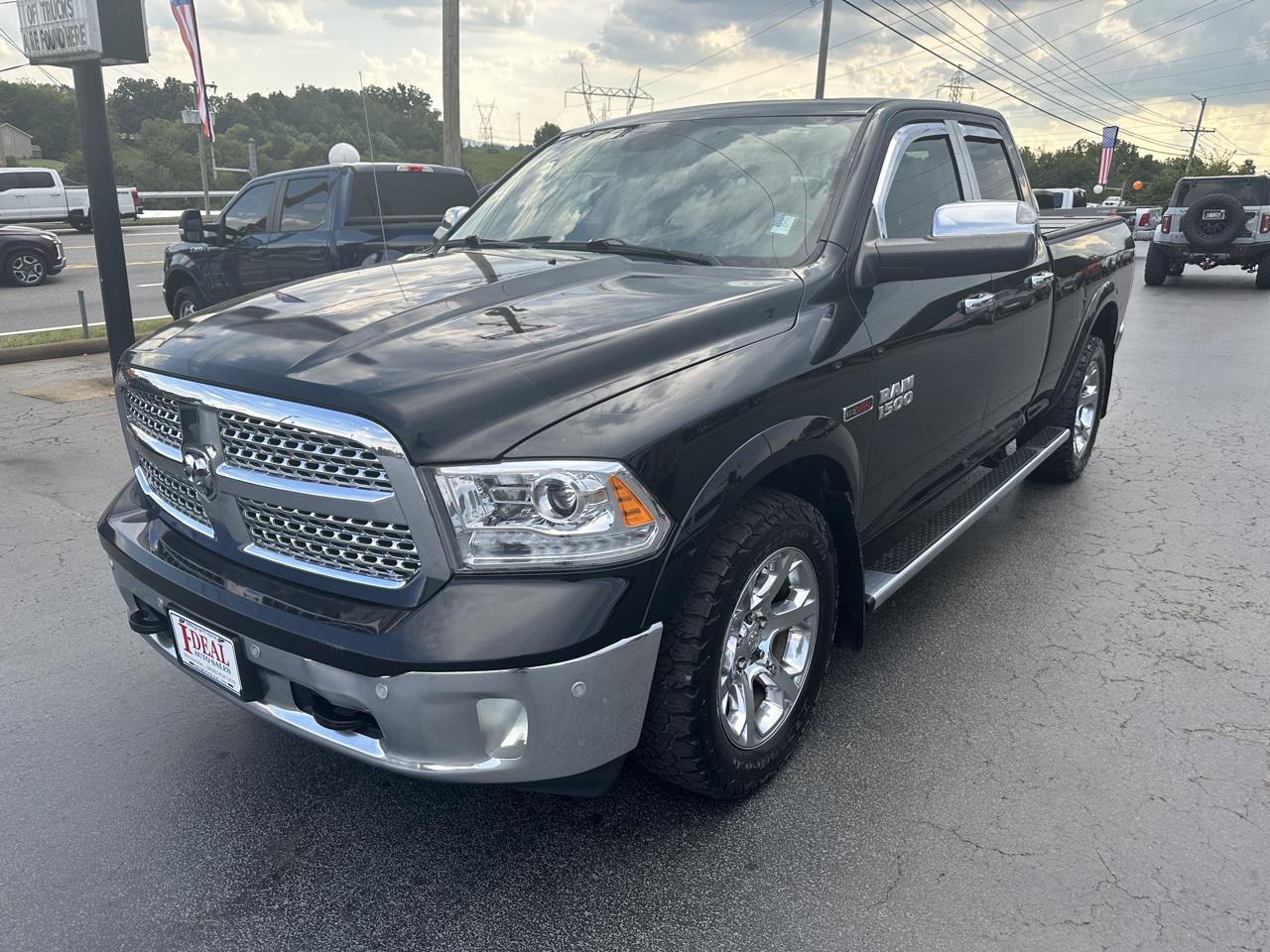 RAM 1500 4WD Quad Cab 140.5" Laramie 2014