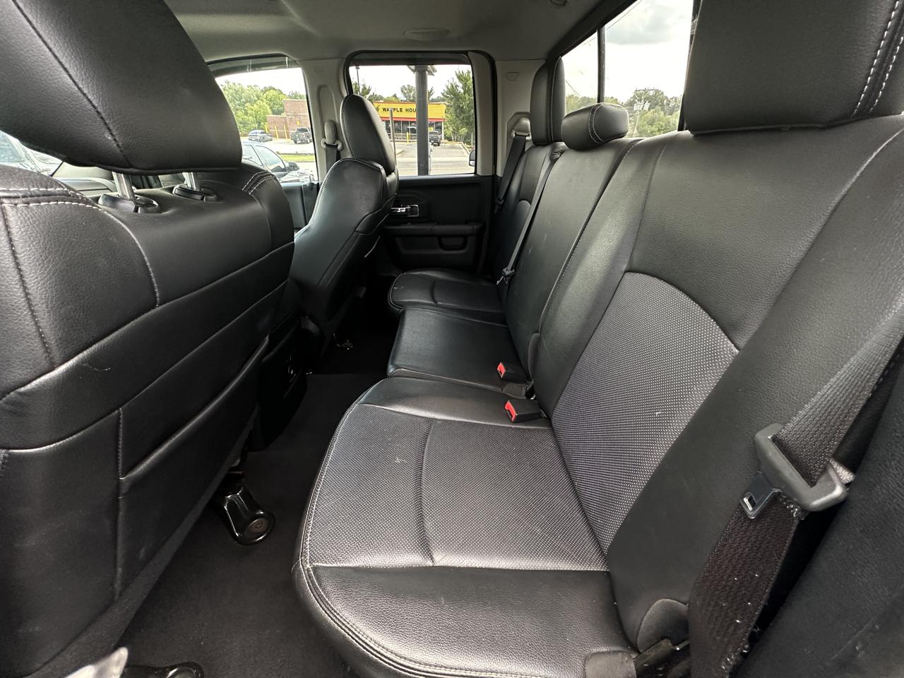 RAM 1500 4WD Quad Cab 140.5" Laramie 2014
