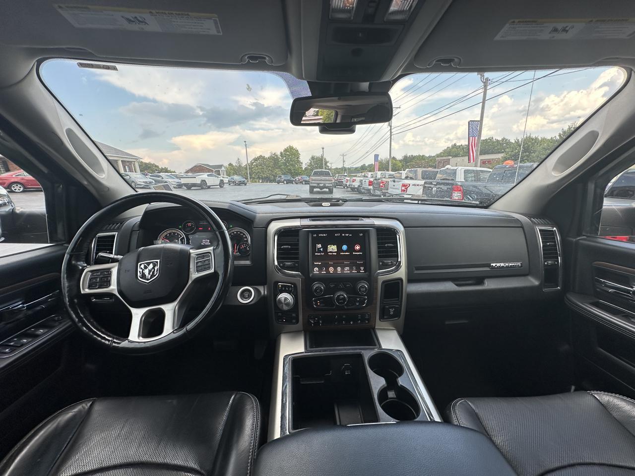 RAM 1500 4WD Quad Cab 140.5" Laramie 2014