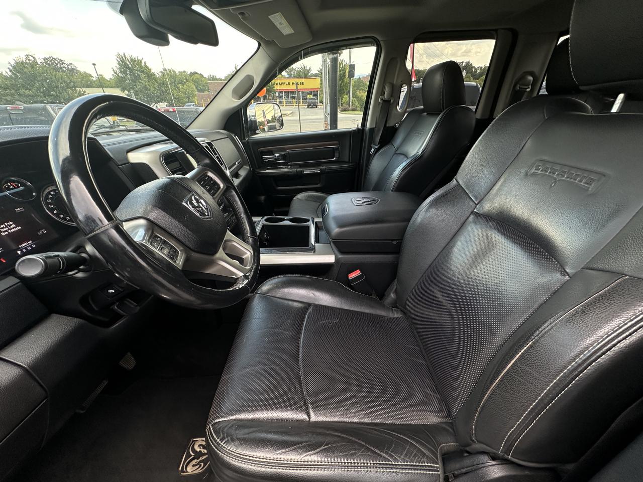 RAM 1500 4WD Quad Cab 140.5" Laramie 2014