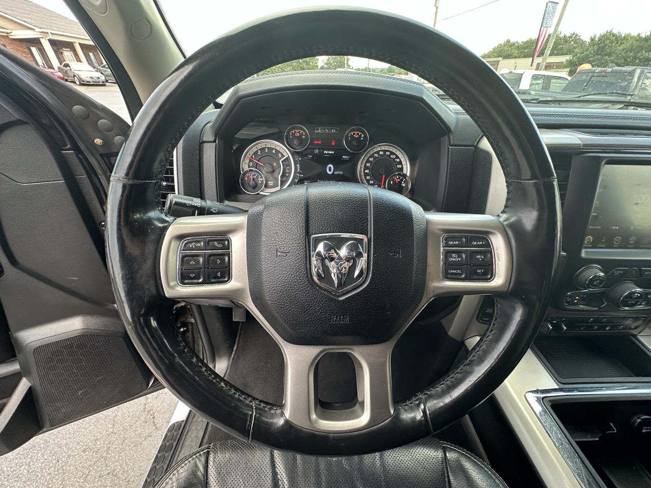 RAM 1500 4WD Quad Cab 140.5" Laramie 2014