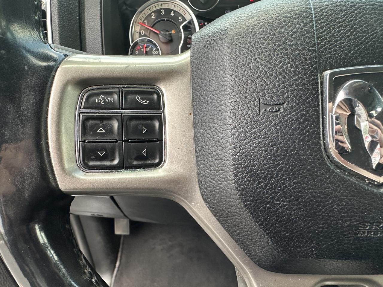 RAM 1500 4WD Quad Cab 140.5" Laramie 2014