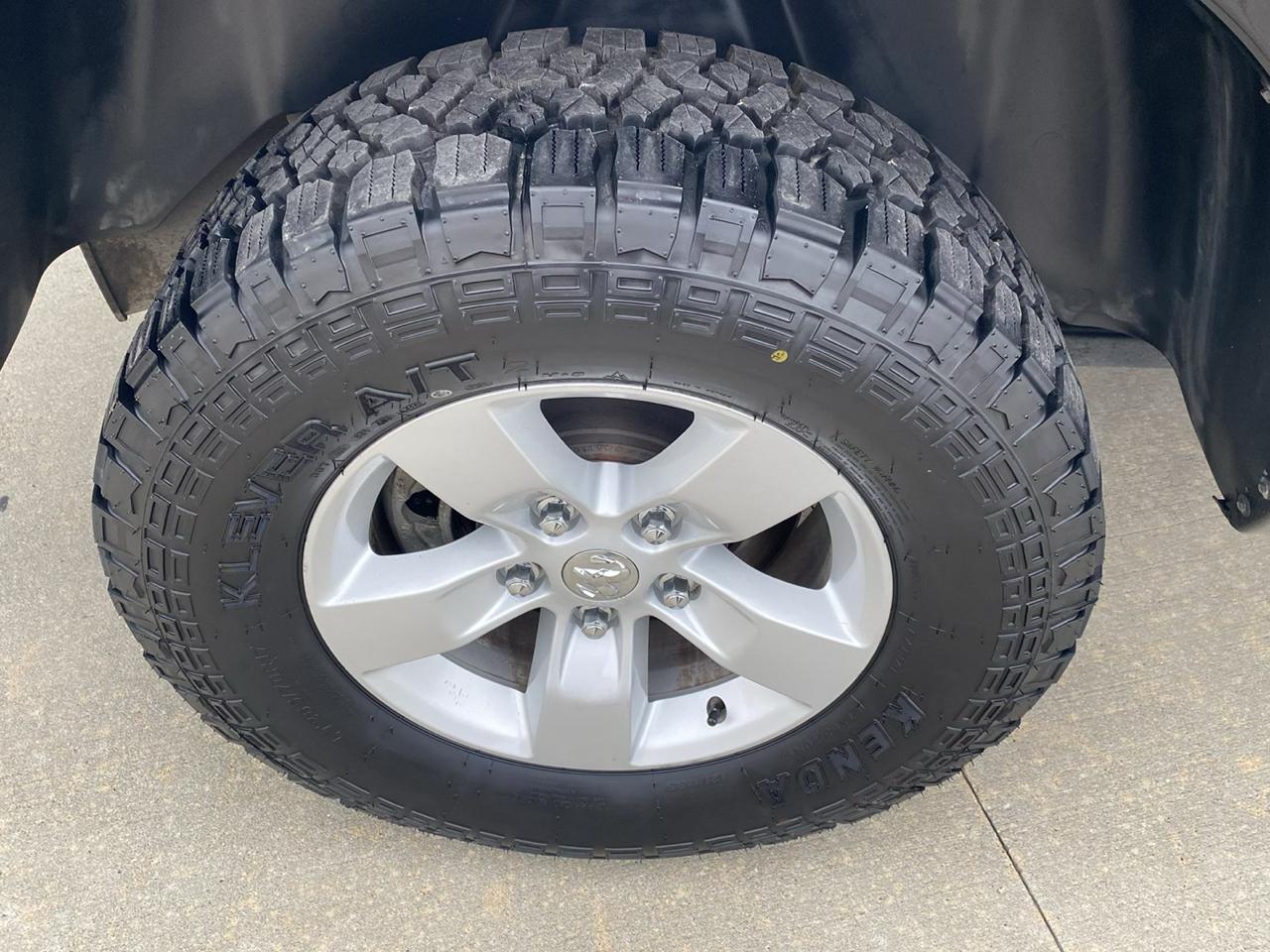 RAM 1500 4WD Quad Cab 140.5" SLT 2014