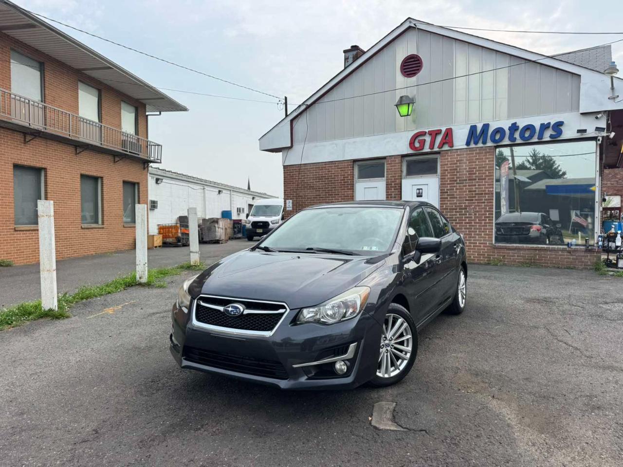 Subaru Impreza Sedan 4dr CVT 2.0i Premium 2016