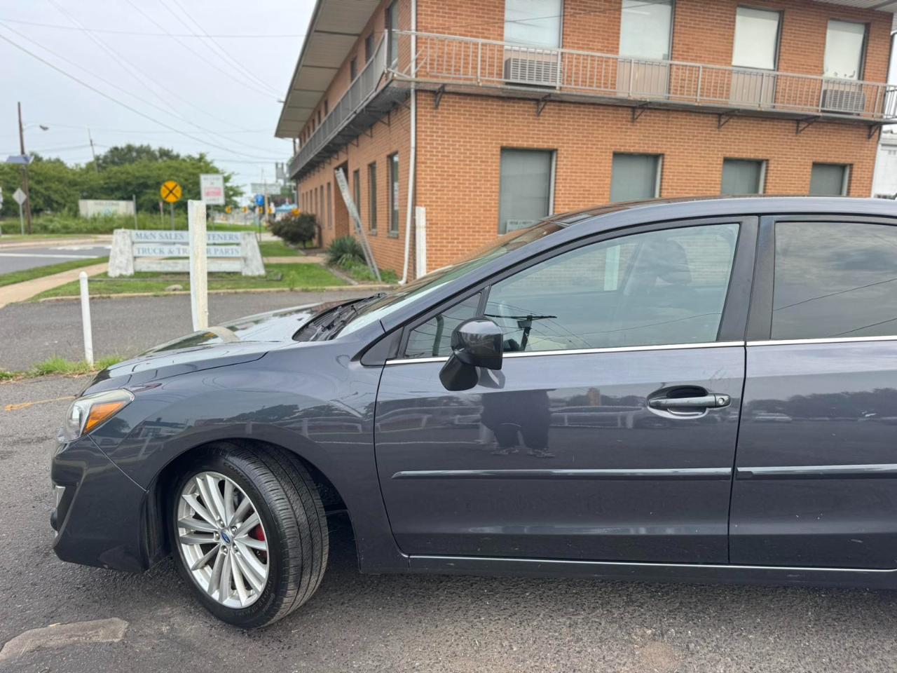 Subaru Impreza Sedan 4dr CVT 2.0i Premium 2016