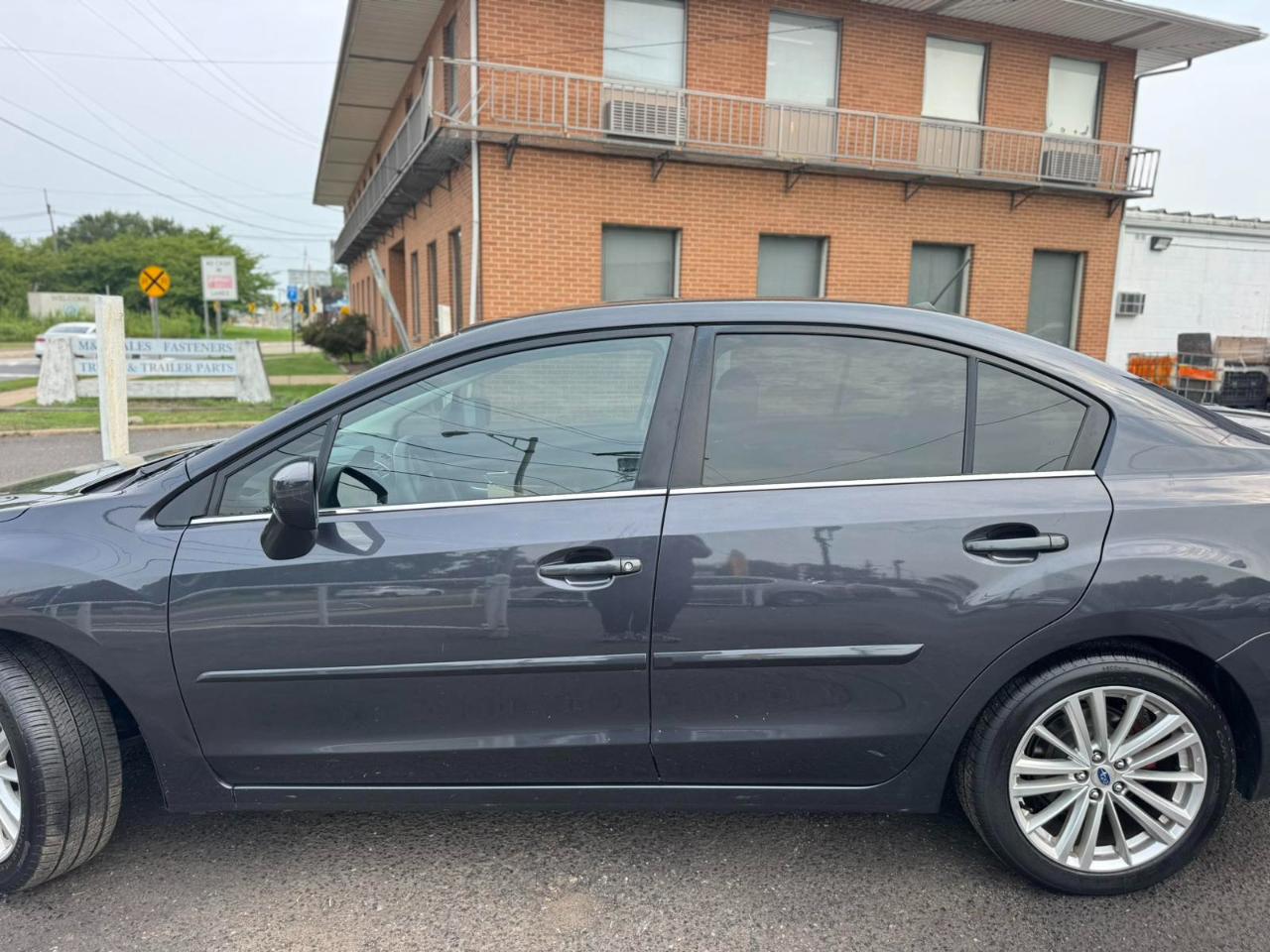 Subaru Impreza Sedan 4dr CVT 2.0i Premium 2016