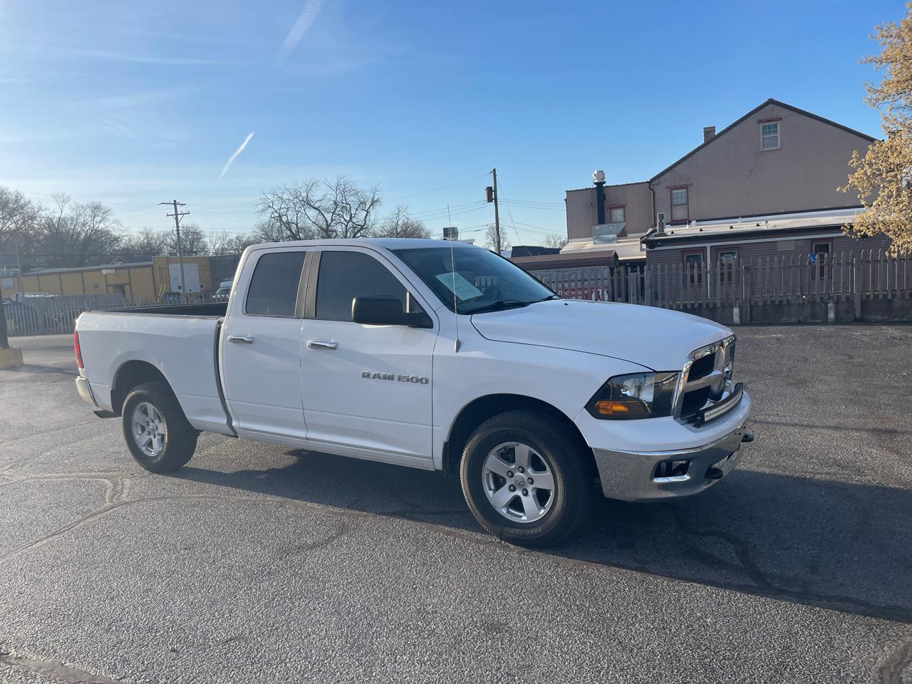 RAM 1500 4WD Quad Cab 140.5" SLT 2011