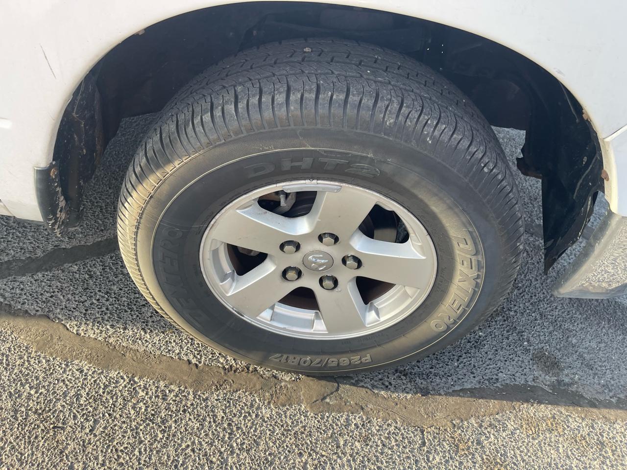 RAM 1500 4WD Quad Cab 140.5" SLT 2011