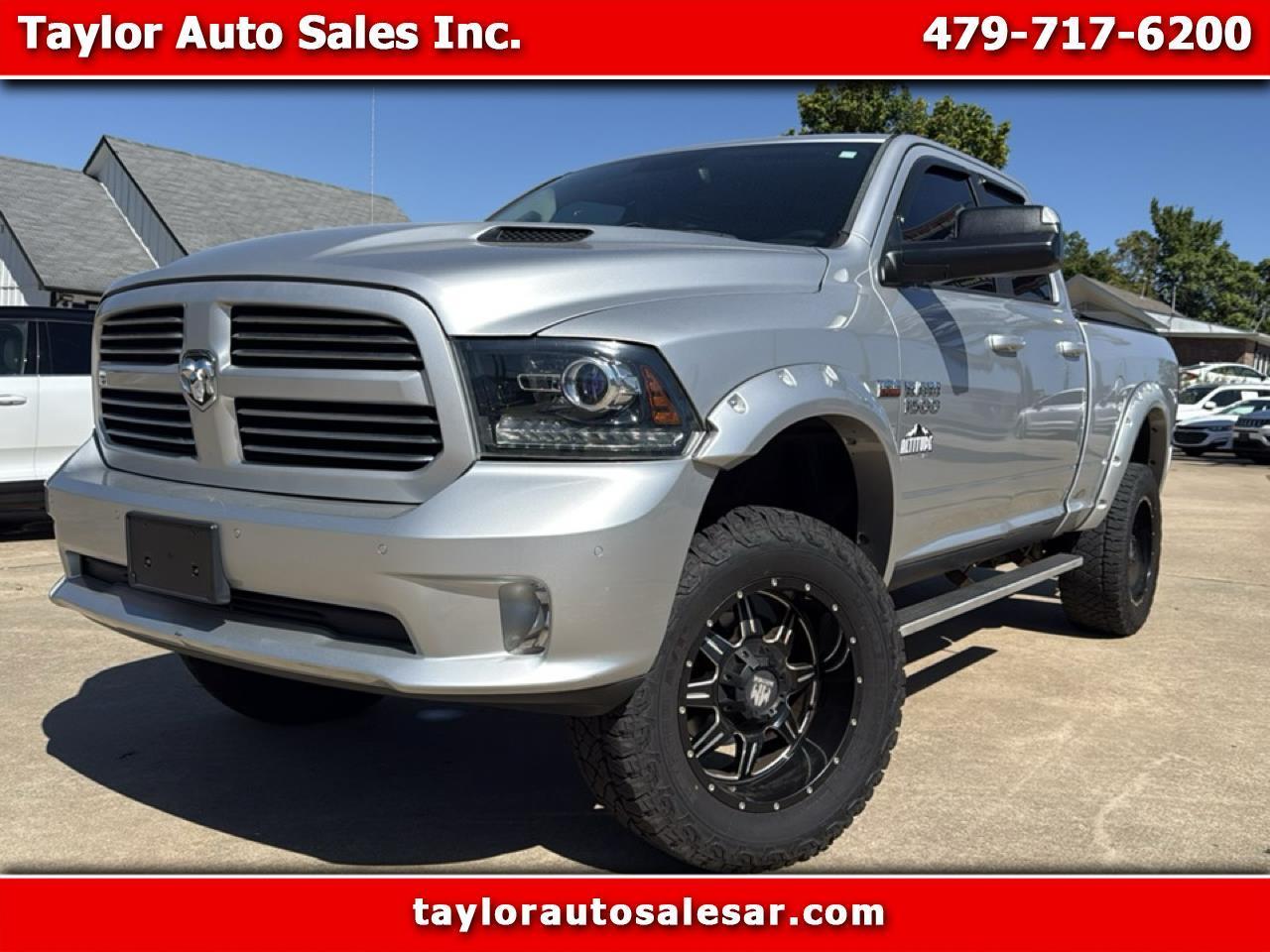 2014 RAM 1500 4WD Quad Cab 140.5" Sport