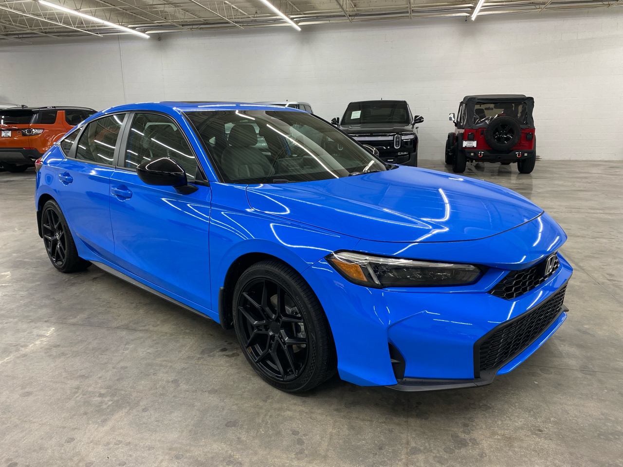 Honda Civic Hatchback Hybrid Sport CVT 2025