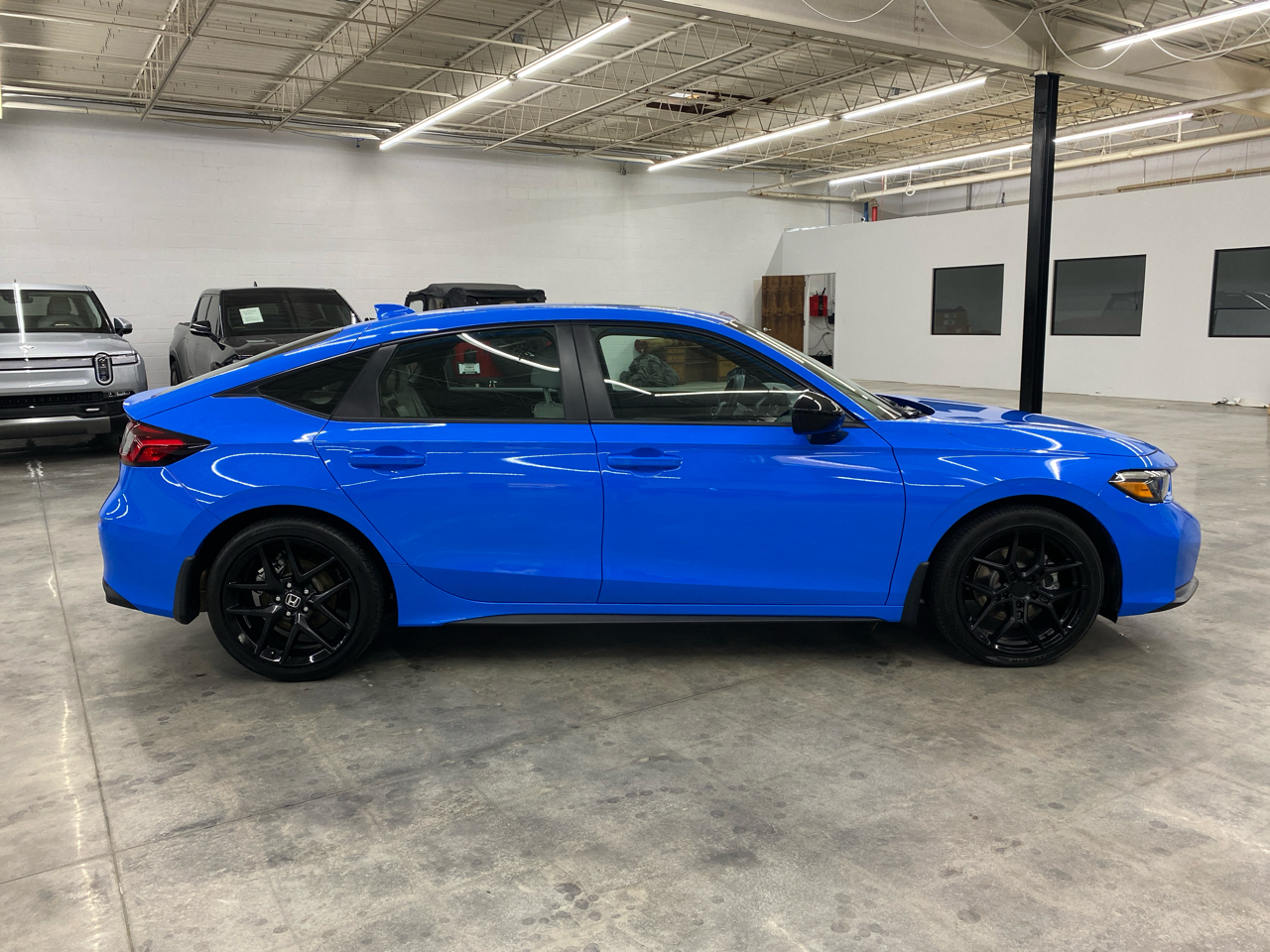 Honda Civic Hatchback Hybrid Sport CVT 2025