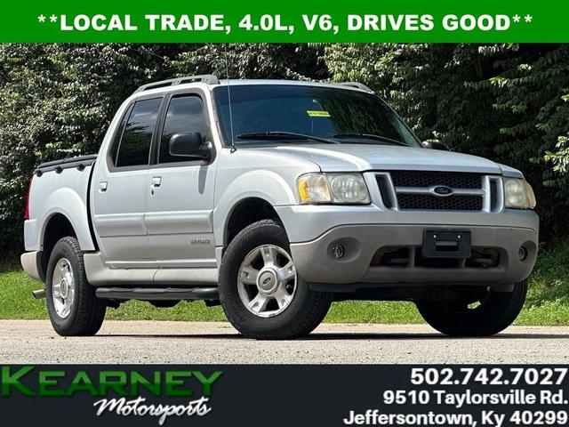 Silver 2002 Ford Explorer Sport Trac Pickup Truck Four-Wheel Drive 5-Speed Automatic Overdrive