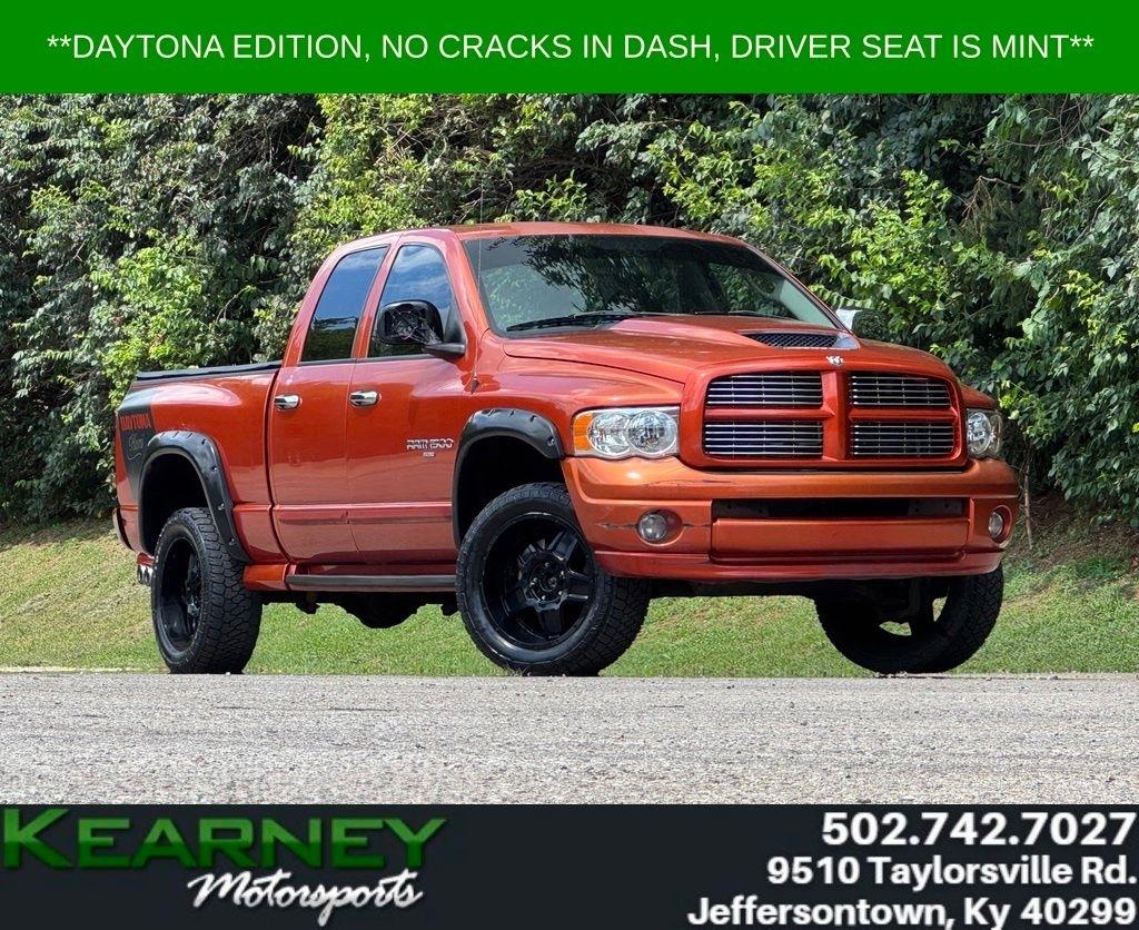 Orange 2005 Dodge RAM 1500 Pickup Truck Four-Wheel Drive 5-Speed Automatic