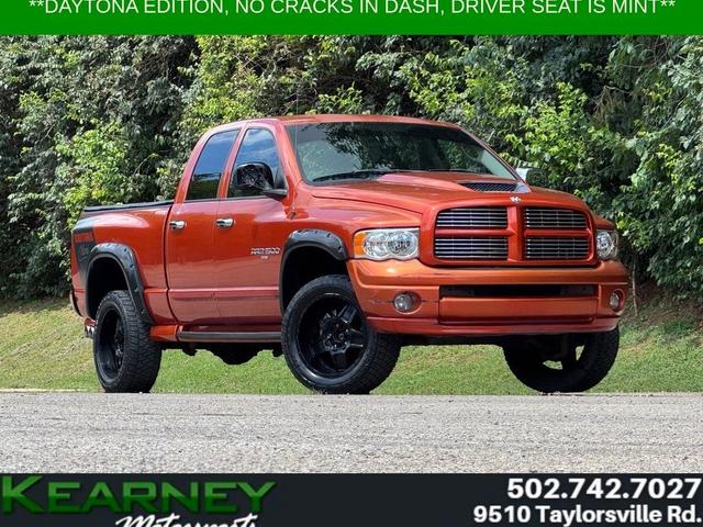 Orange 2005 Dodge RAM 1500 Pickup Truck Four-Wheel Drive 5-Speed Automatic