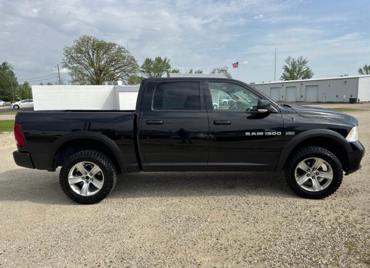RAM 1500 4WD Crew Cab 140.5" Sport 2011