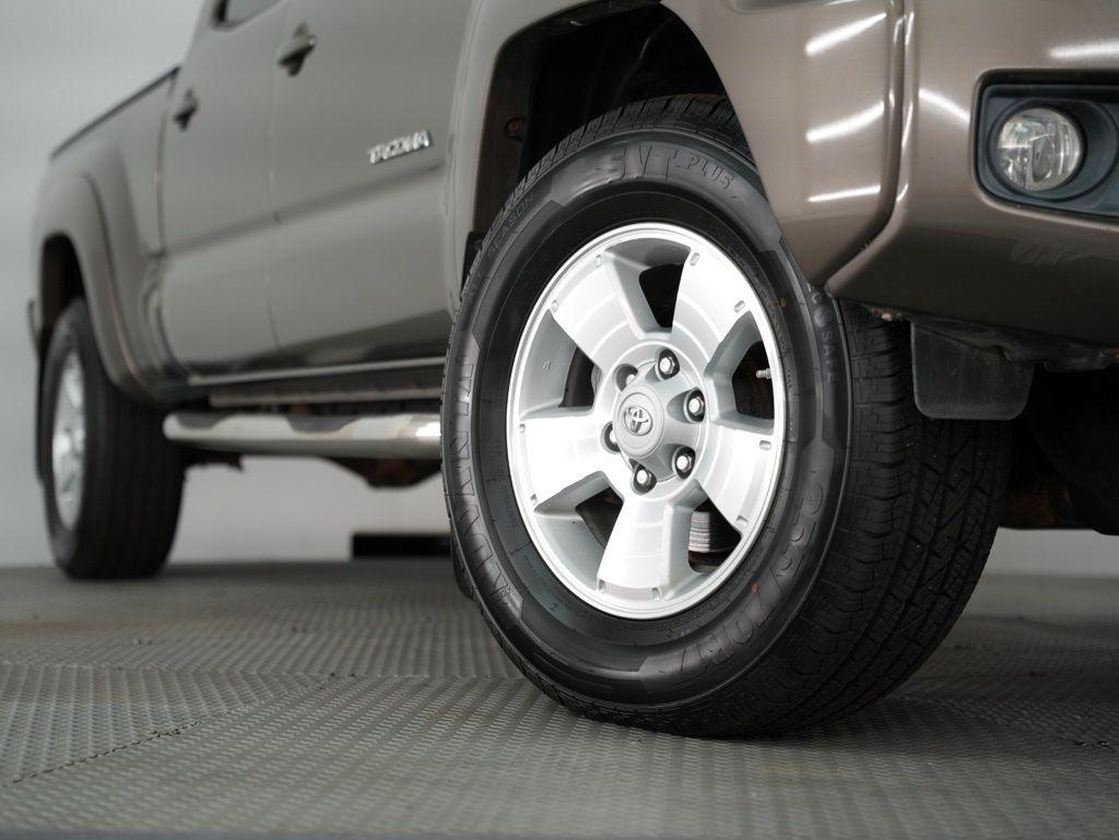 Toyota Tacoma 4WD Double Cab LB V6 AT (Natl) 2012