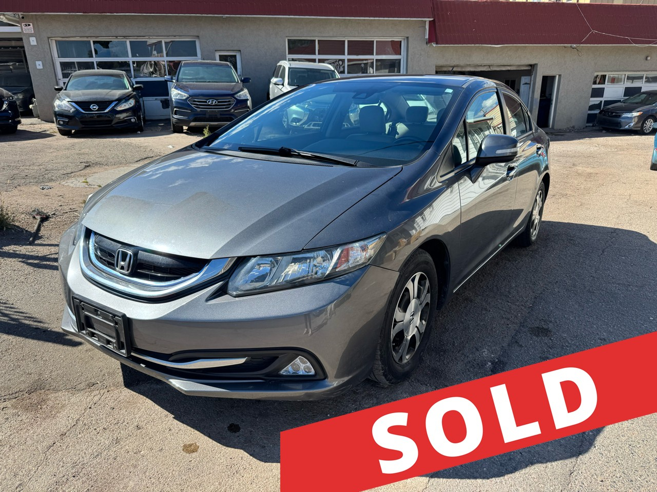 2013 Honda Civic Hybrid 4dr Sdn L4 CVT