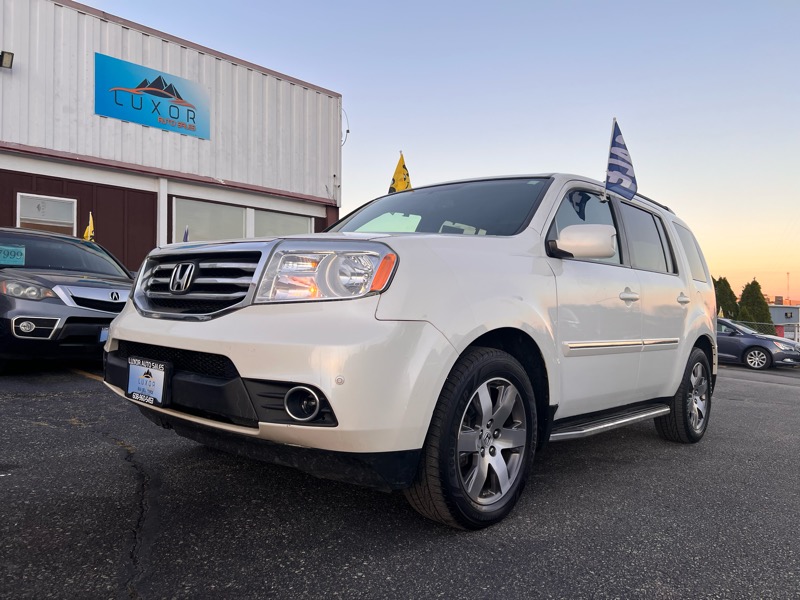Honda Pilot Touring 4WD 5-Spd AT with DVD 2014 Honda Pilot Touring 4WD 5-Spd AT with DVD 2014