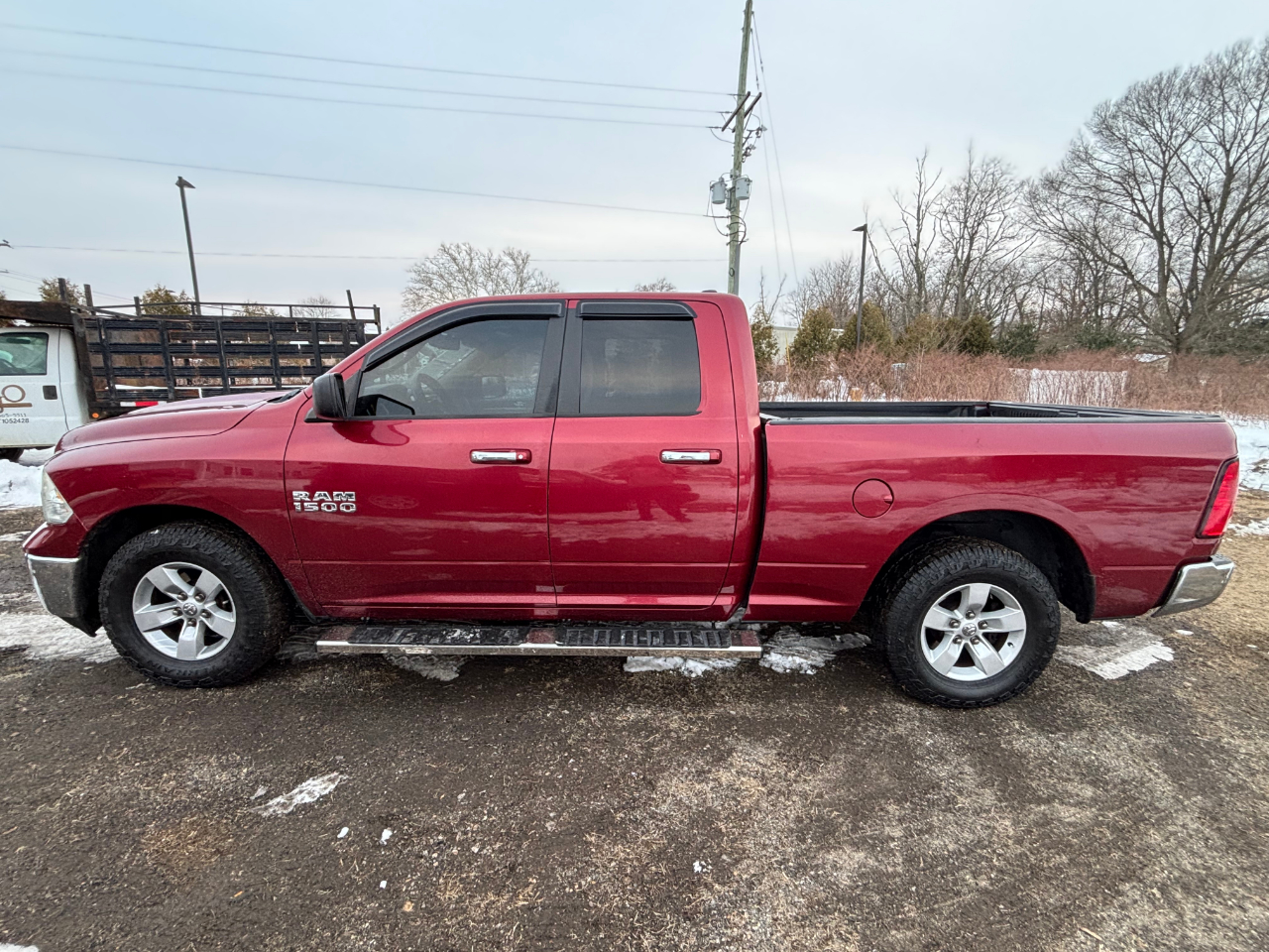 RAM 1500 2WD Quad Cab 140.5" SLT 2015