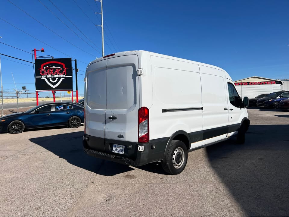 Ford Transit 150 Van Med. Roof w/Sliding Pass. 148-in. WB 2015