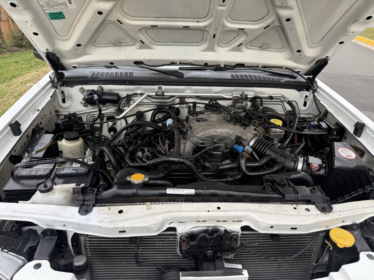 Nissan Frontier 4WD XE Crew Cab V6 Manual Long Bed 2004