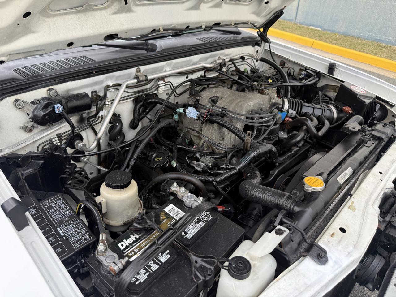 Nissan Frontier 4WD XE Crew Cab V6 Manual Long Bed 2004