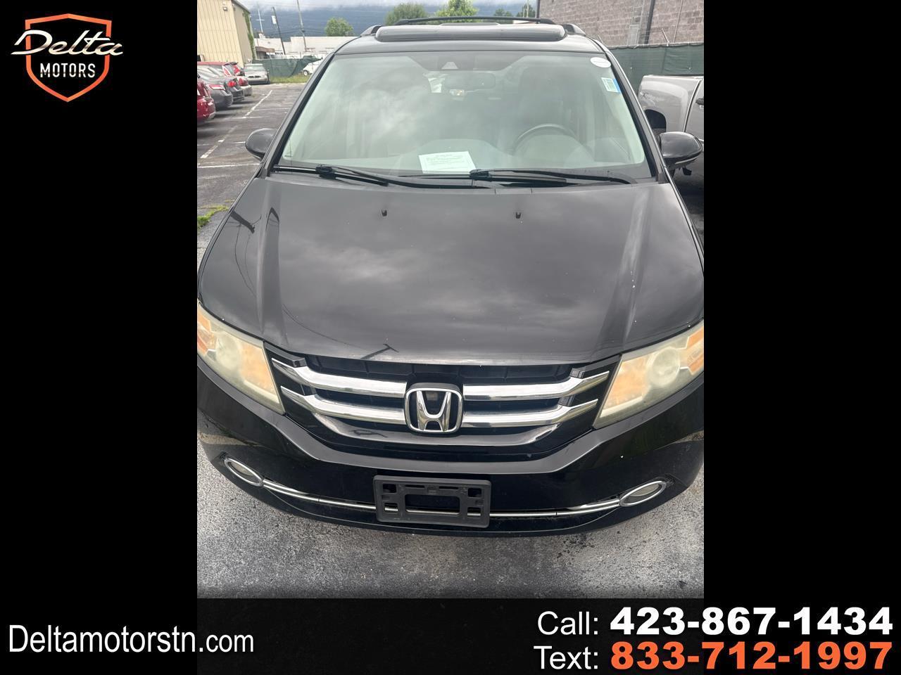 2014 Honda Odyssey Touring's photo