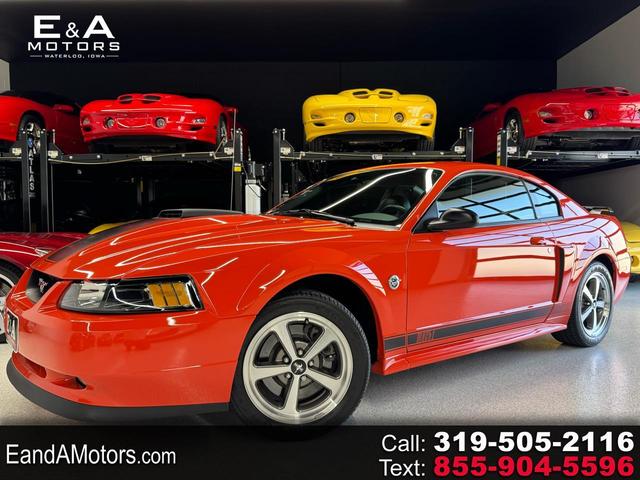 Orange 2004 Ford Mustang Coupe Rear-Wheel Drive 5-Speed Manual