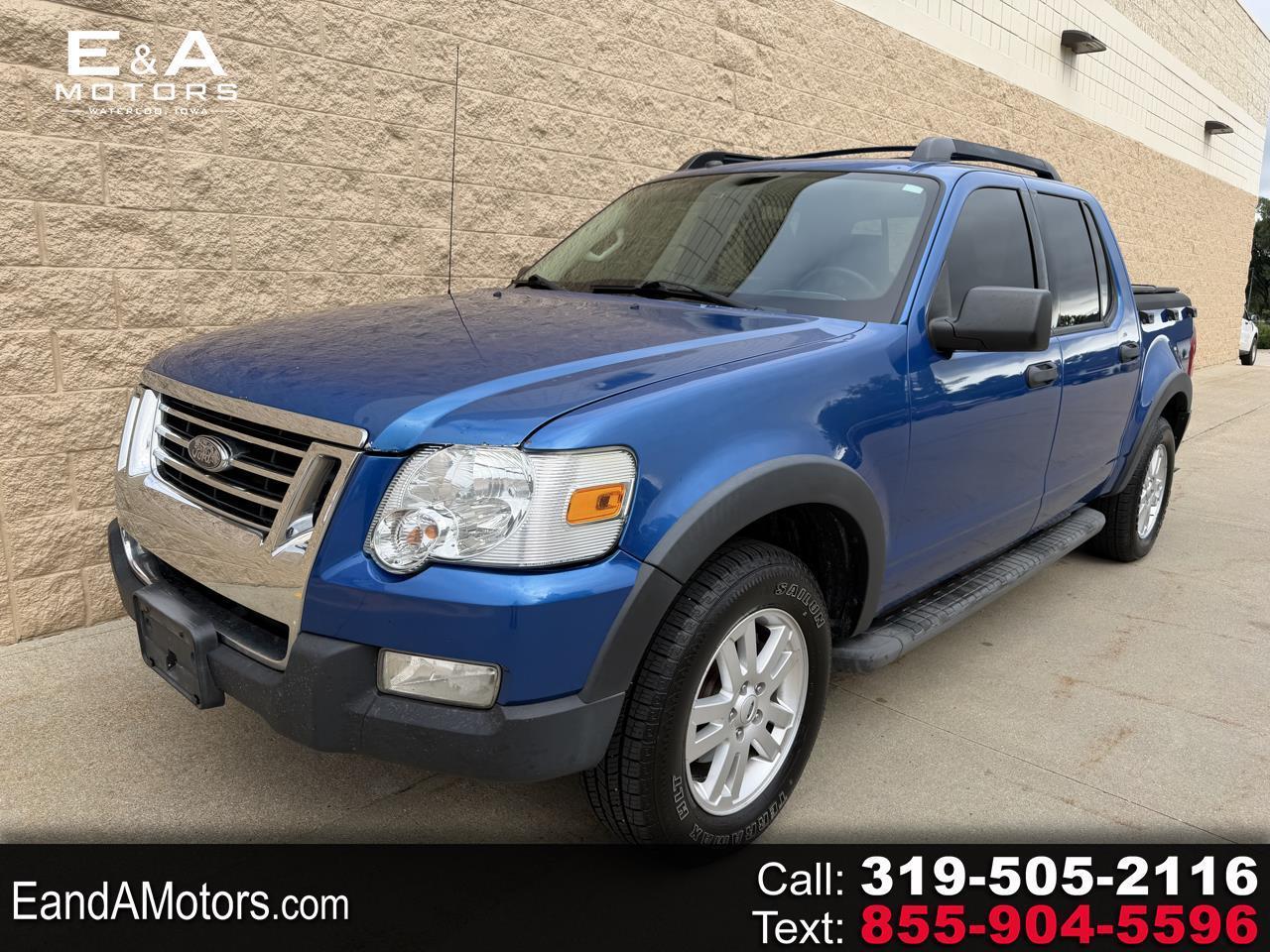 Blue 2010 Ford Explorer Sport Trac Pickup Truck Four-Wheel Drive Automatic