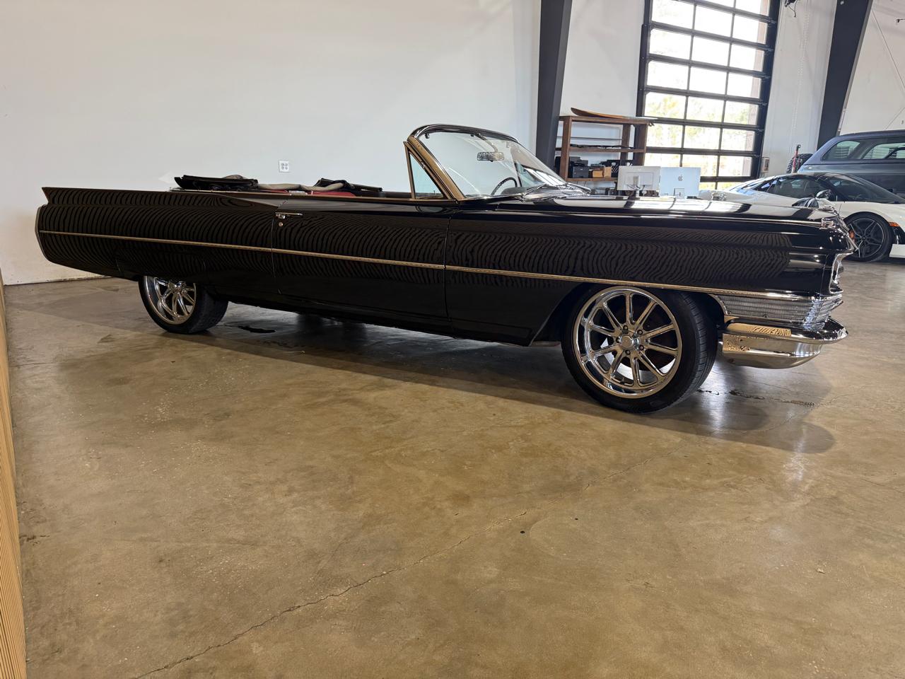 1964 Cadillac DeVille - Black exterior view 7