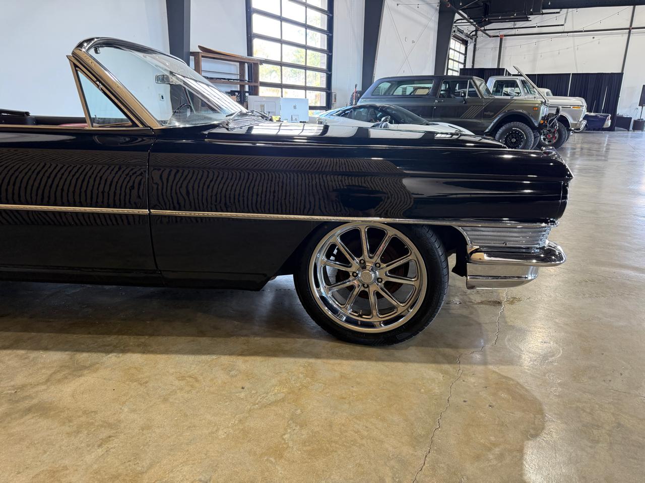 1964 Cadillac DeVille - Black exterior view 10