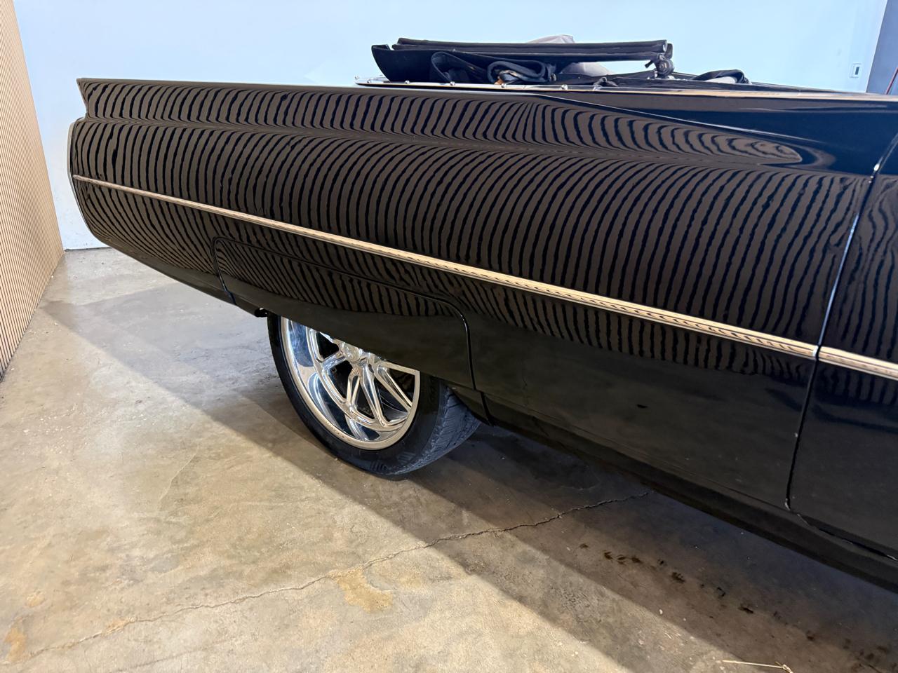 1964 Cadillac DeVille - Black exterior view 13