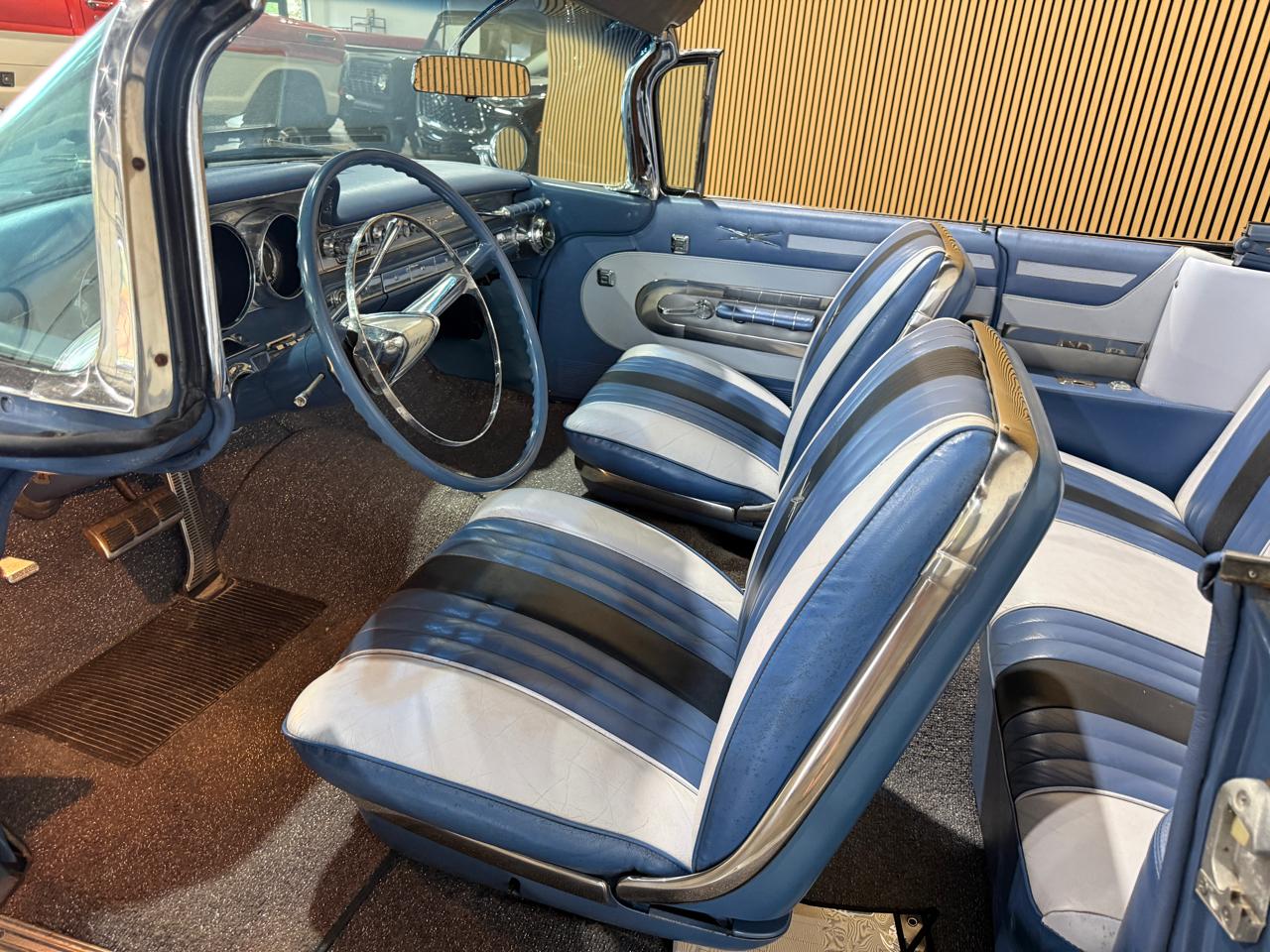 1959 Pontiac Bonneville Convertible - Blue exterior view 3