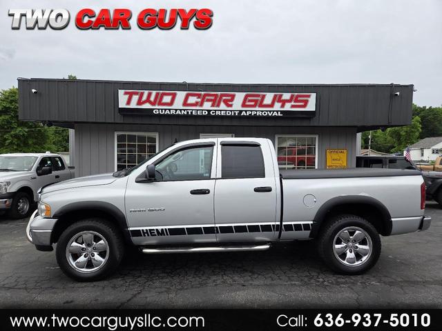 Silver 2004 Dodge RAM 1500 Laramie Quad Cab 4WD Pickup Truck Four-Wheel Drive