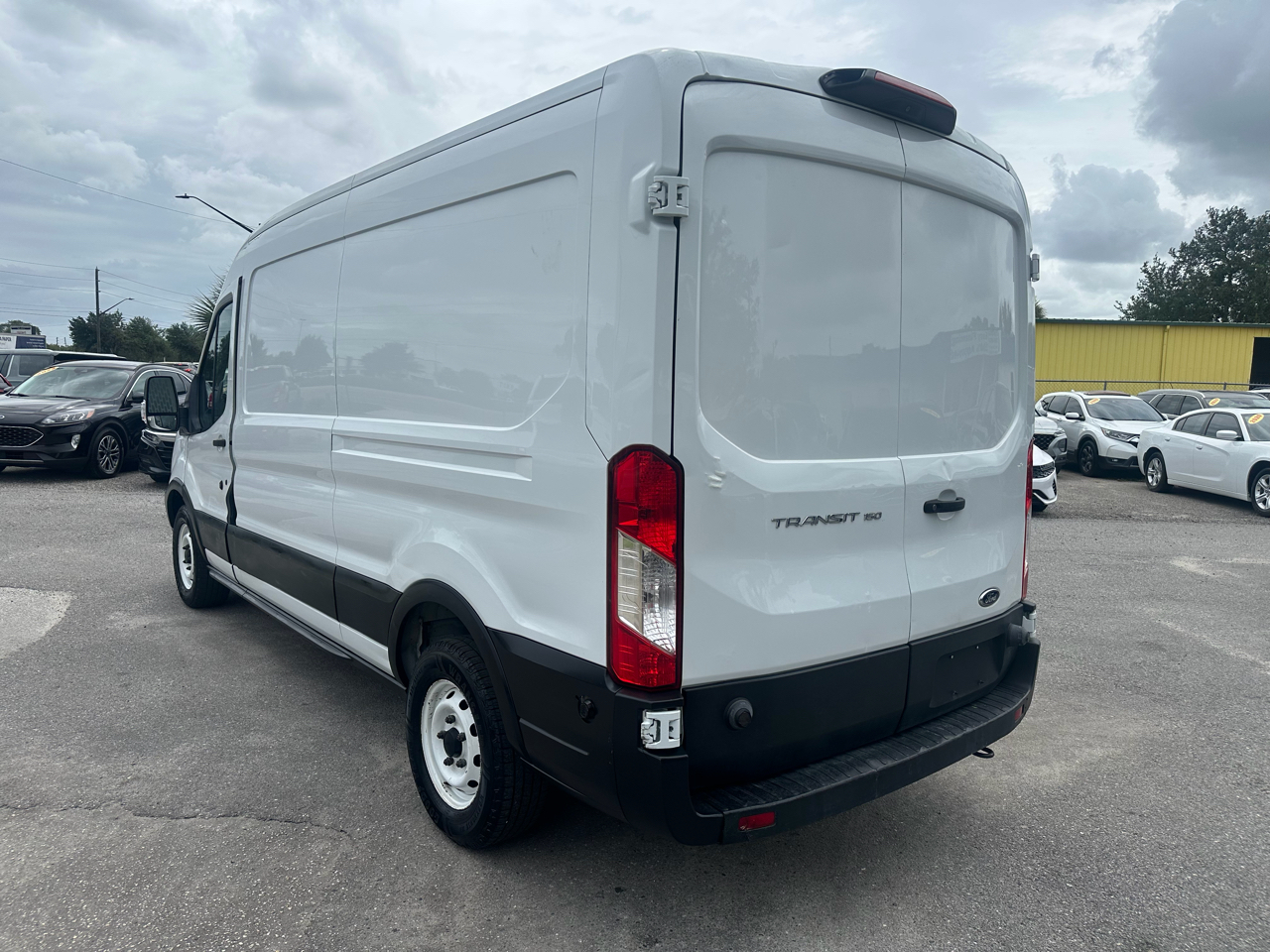 Ford Transit Van T-150 148" Med Rf 8600 GVWR Sliding RH Dr 2019
