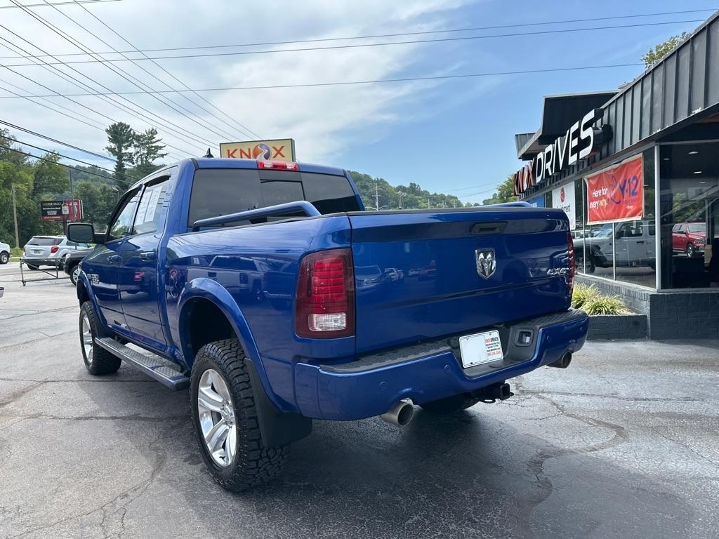 RAM 1500 4WD Crew Cab 140.5" Sport 2014