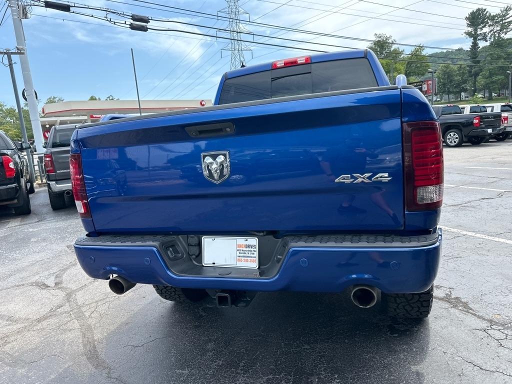 RAM 1500 4WD Crew Cab 140.5" Sport 2014