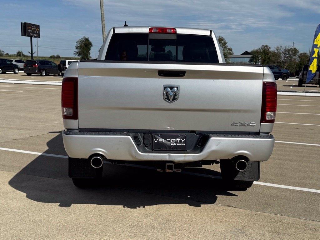 RAM 1500 4WD Quad Cab 140.5" Sport 2016
