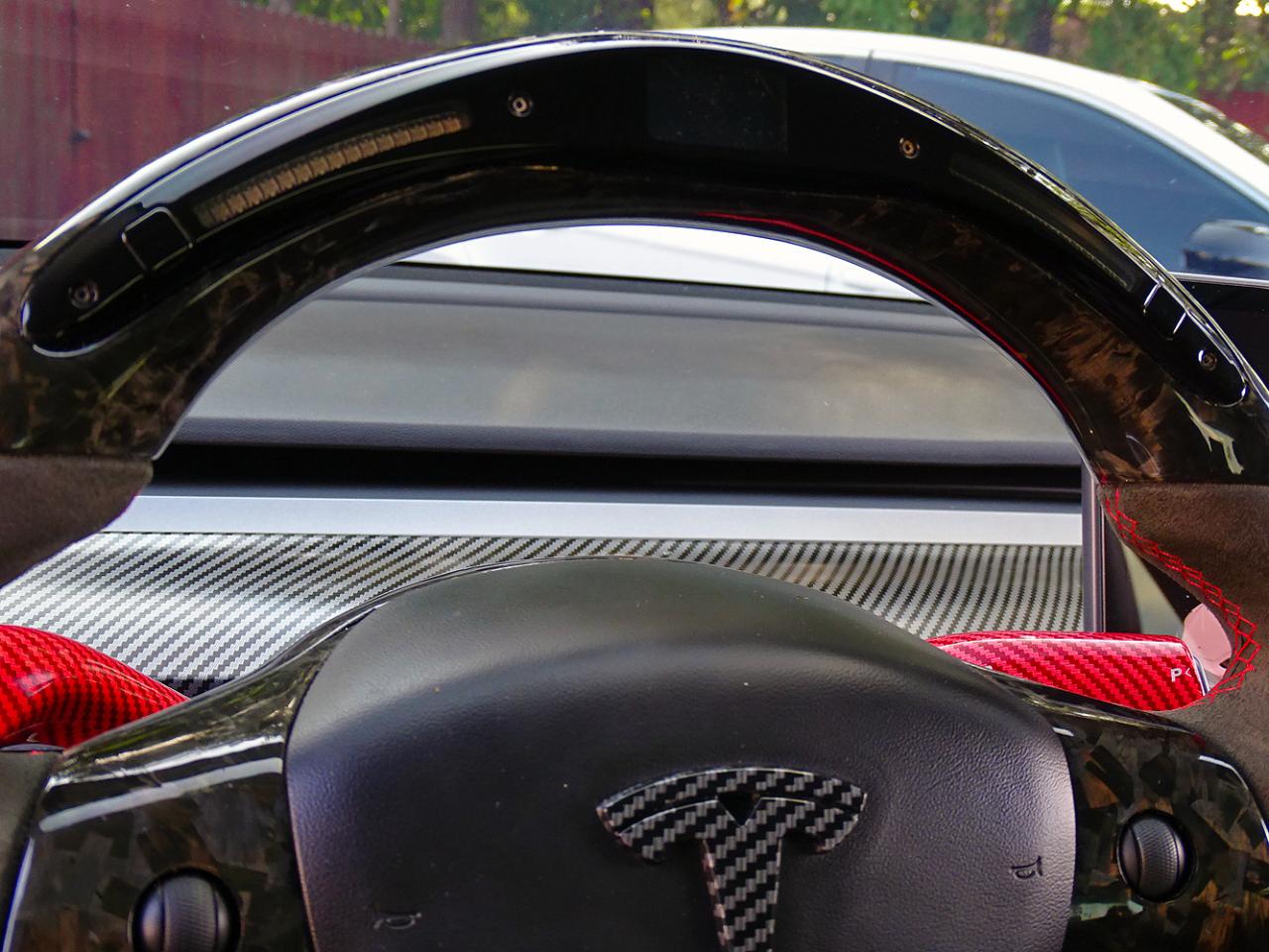 Tesla Model 3 photo 17